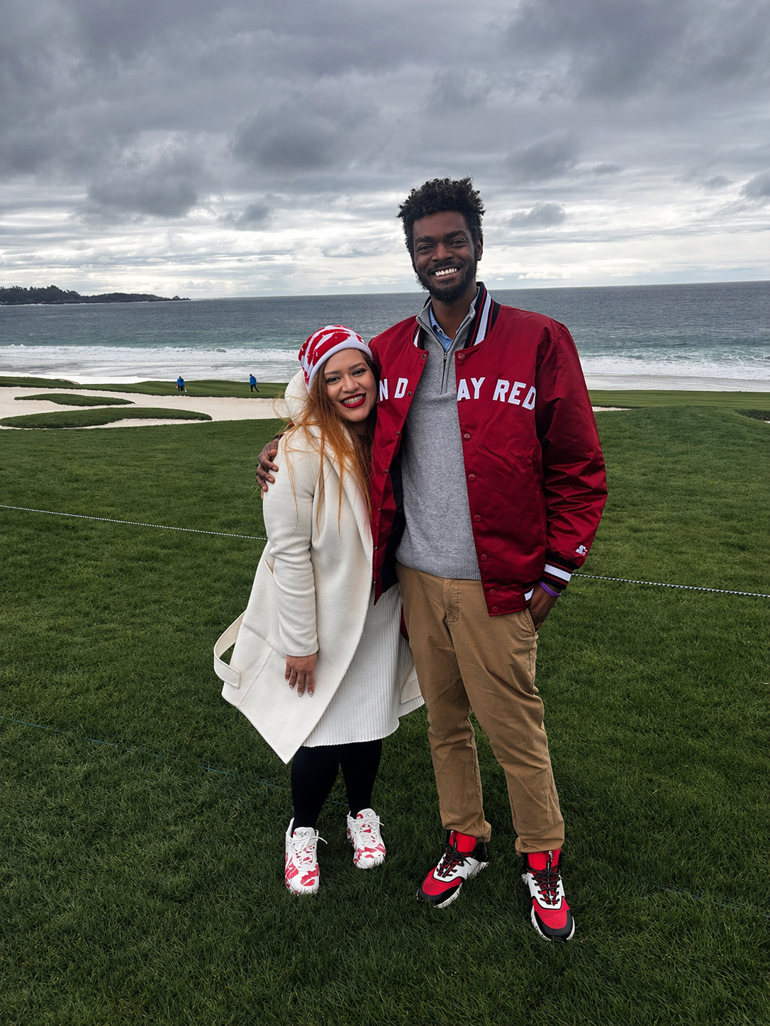 Ruby and Marvin Vitatoe at the AT&T Pebble Beach Pro-Am, ocean horizon behind